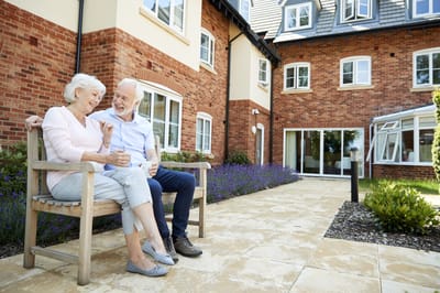 Couple enjoying time outdoors at the facility