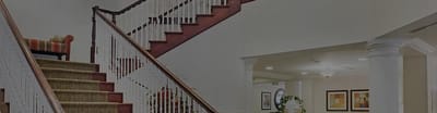 Interior staircase leading to a common area