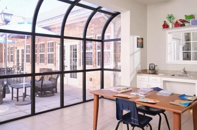 Bright common area with view to outdoor space