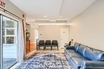 Interior view of a waiting area with seating