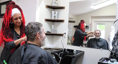 Resident getting a haircut in a salon