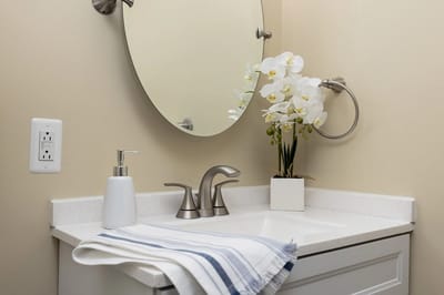 Modern sink and countertop with decorative flowers