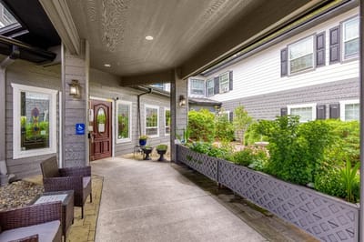 Entrance area with decorative plants and seating