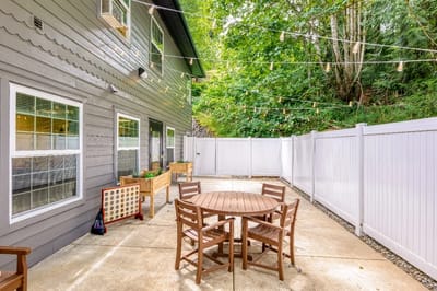 Outdoor seating area with string lights and table