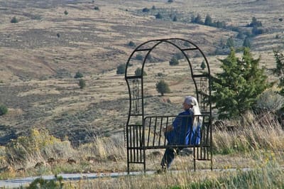 A resident enjoying the view in an outdoor space