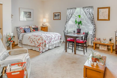 Cozy private resident room with floral decor