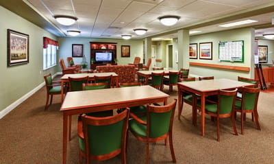 Bright common area with tables and seating