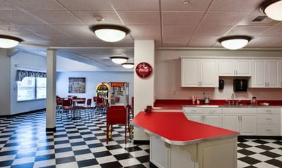 Interior view of a dining area with checkerboard flooring