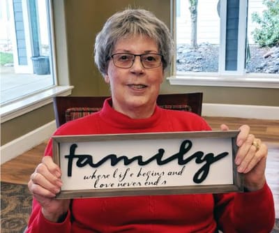 Resident holding a sign about family values