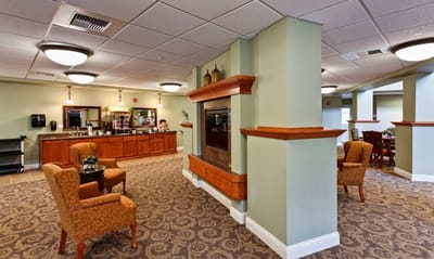 Common area with seating and a fireplace