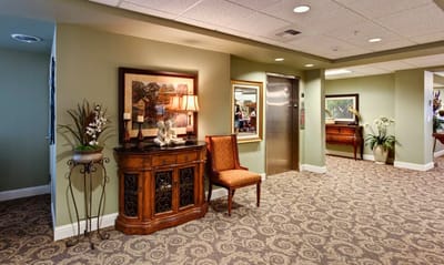 Interior hallway with seating and artwork