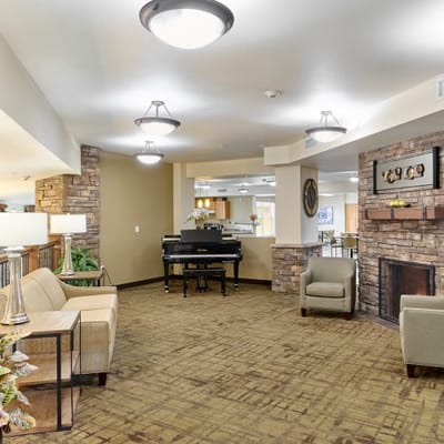 Cozy common area with seating and piano