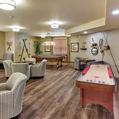 Interior common area with pool and game tables