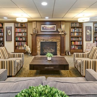 Interior common area with seating and bookshelves