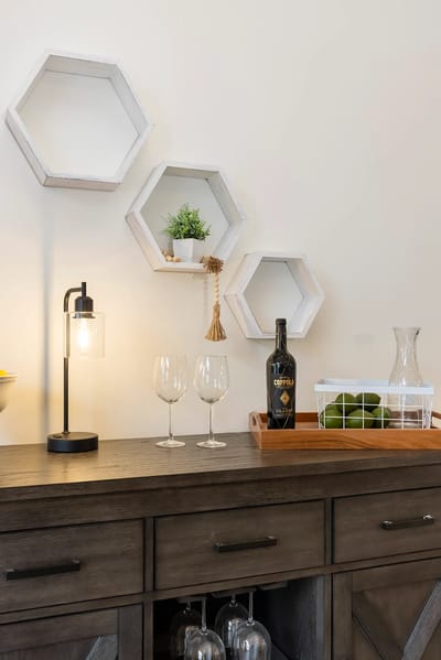 Maple Ridge Assisted Living, Nursing Home in Mt Ayr, IA — Stylish interior decor with a light fixture and glasses