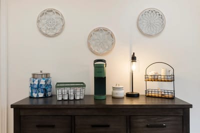 Maple Ridge Assisted Living, Nursing Home in Mt Ayr, IA — Decorative items on a wooden table in a common area