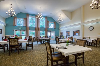 Dining room with tables set for meals