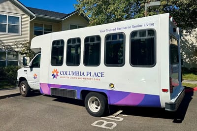 Facility transport vehicle with branding