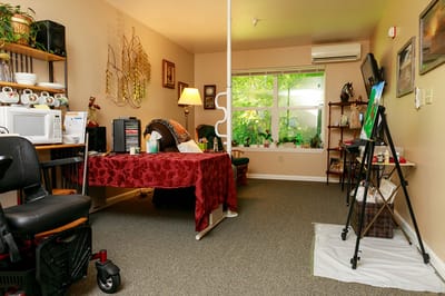 Cozy interior space with an art easel and plants