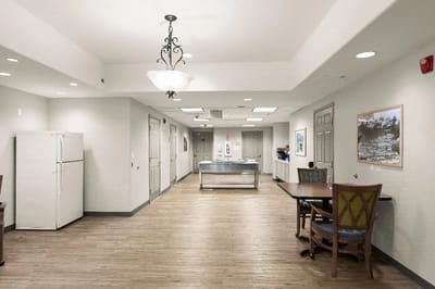 Bright interior hallway with dining area