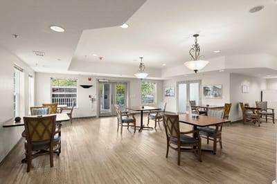 Bright and open common area with tables and chairs