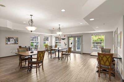 Bright common area with chairs and tables