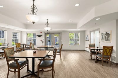 Bright dining room with tables and chairs