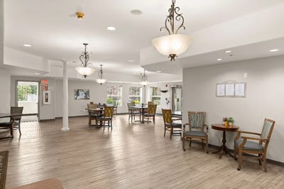 Bright common area with tables and chairs