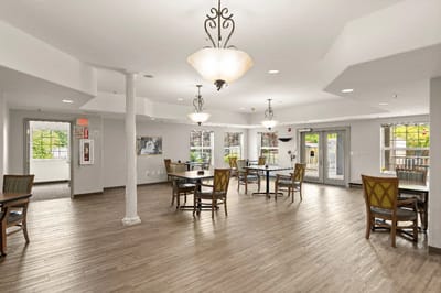Interior view of a bright common area with seating