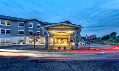 Entrance of Sea View Senior Living Community at dusk