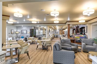 Bright common area with tables and seating