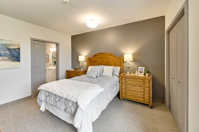 Cozy resident room with a bed and nightstands