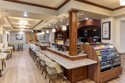 Interior view of a dining area with seating and snacks