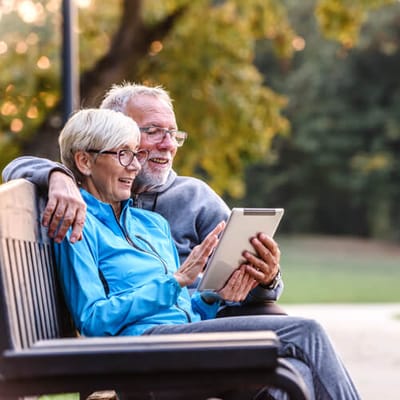 Spiritrust Lutheran – the Village at Sprenkle Drive, nursing home in York, PA — Couple enjoying time together on a park bench