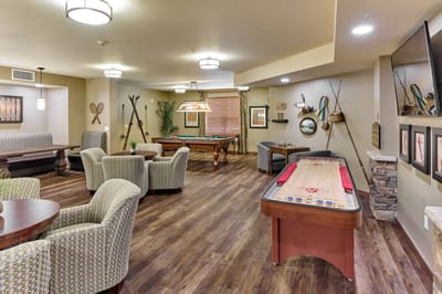 Common area with games and seating for residents