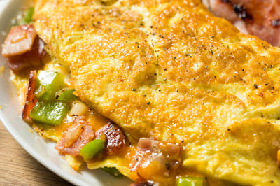 Lehigh Commons, nursing home in Macungie, PA — Delicious vegetable and bacon omelet on a plate