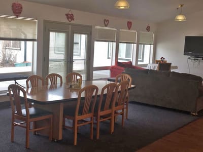 Bright common area with seating and windows