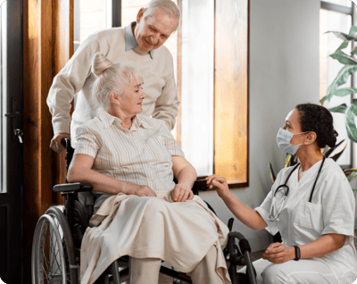 Nurse interacting with residents in a common area