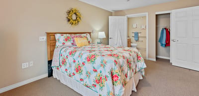 Cozy resident room with floral bedding