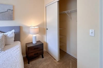 Cozy interior of a resident's room with a nightstand