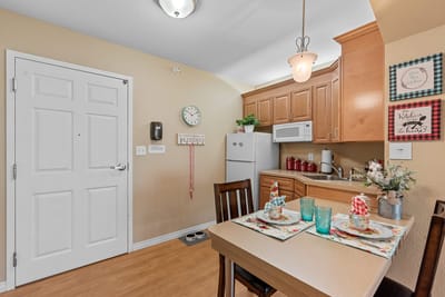 Well-decorated kitchen space with dining table