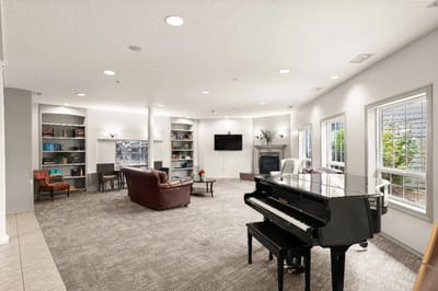 Interior view of a lounge area with piano