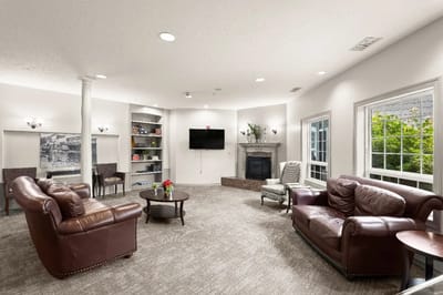 Cozy common area with comfortable seating and fireplace