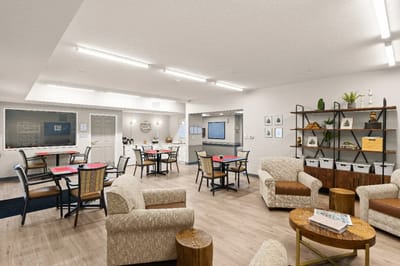 Common area with seating and dining tables