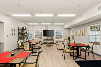 Bright common area with tables and seating