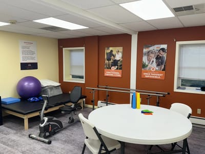Activity room with equipment and posters on the wall