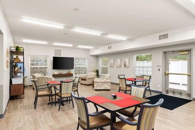 Bright dining room with tables and chairs