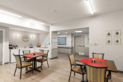 Bright dining area with tables and chairs