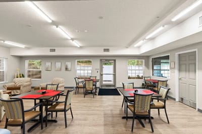 Bright dining area with tables and chairs