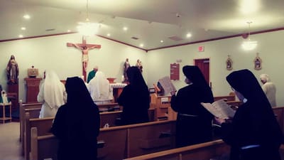 Residents participating in a religious service